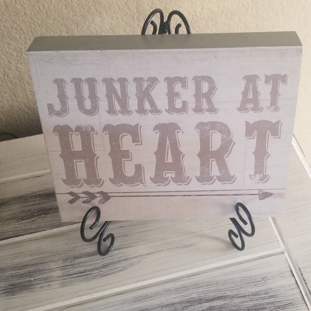 Wooden Junker sign with ornate iron stand